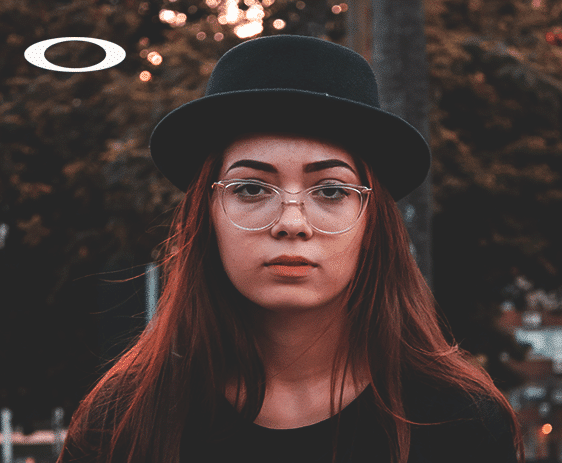 Girl wearing a hat & Oakley glasses