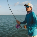 man wearing fishing sunglasses