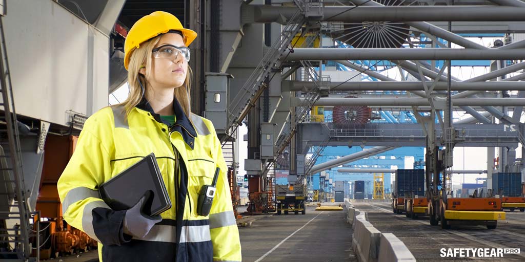 Woman wearing hardhat and safety vest