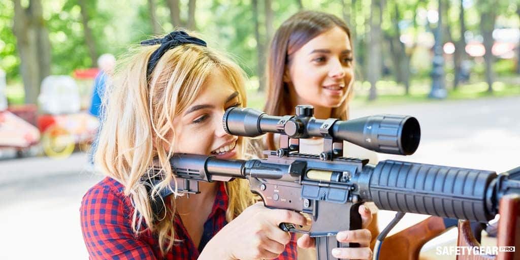 Woman using shooting gun