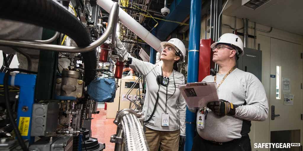 Workers wearing prescription safety glasses