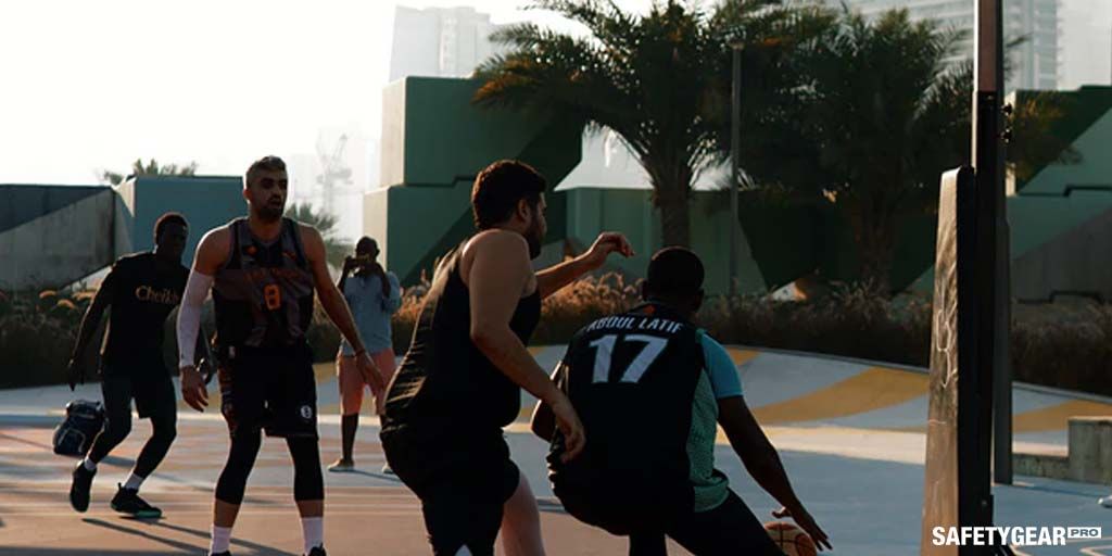 Men playing basketball