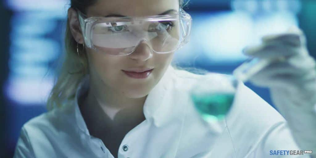 woman wearing safety glasses in laboratory
