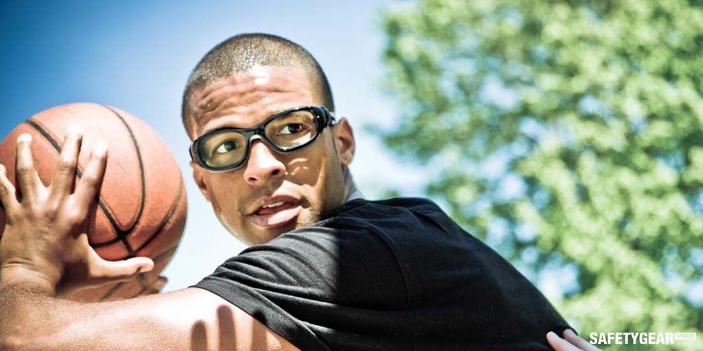 man wearing basketball glasses while playing