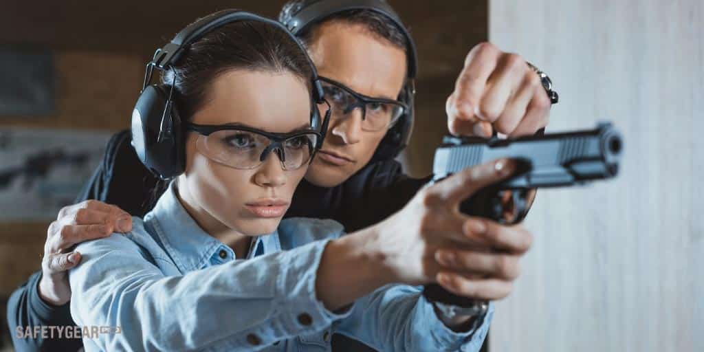 Couple Wearing Shooting Glasses