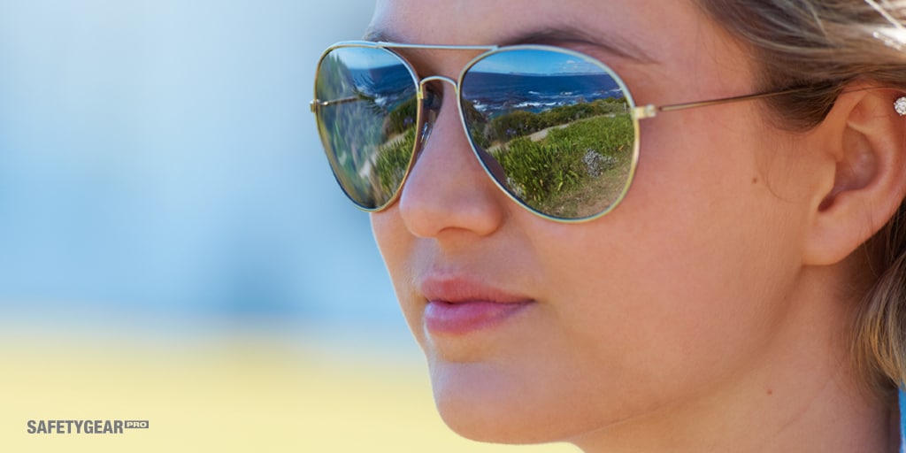 woman wearing aviator sunglasses