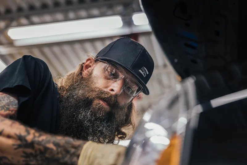 Mechanic wearing prescription safety glasses
